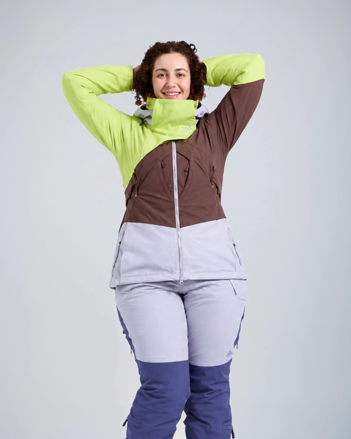 Pear and hourglass body shape wearing our Zali snow pants, cut for a narrower waist and fuller hips