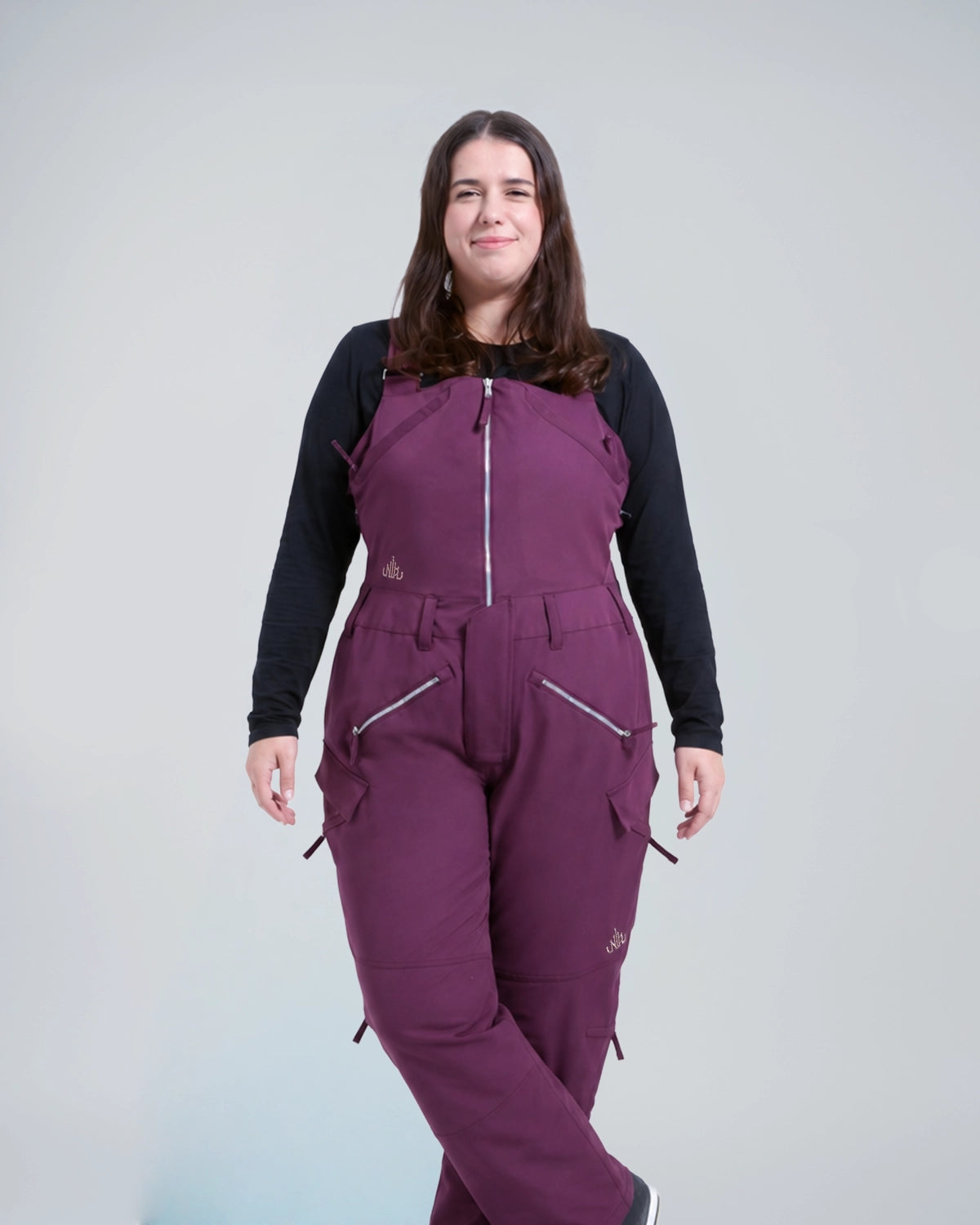 Subtle curve body shape wearing our Mila snow pants, cut for a slightly defined waist